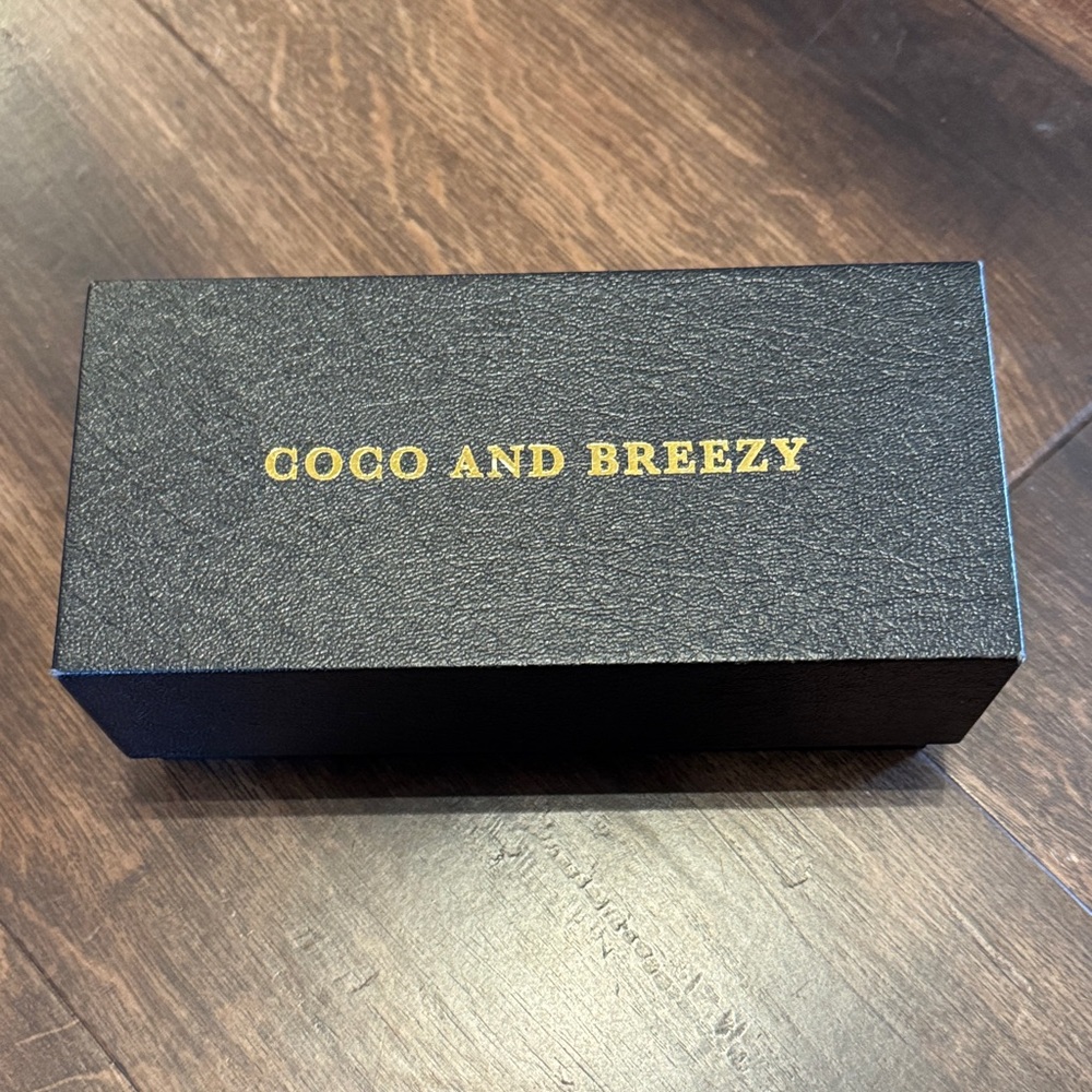 Coco and Breezy Black Protective Box with Gold Logo
